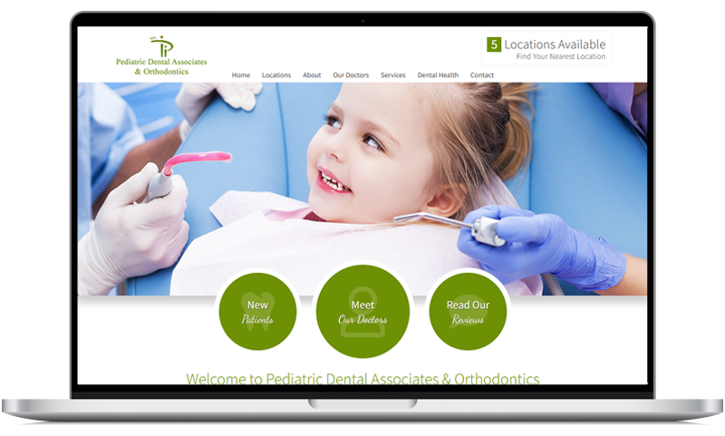 Pediatric Dental Associates website displayed on a tablet.